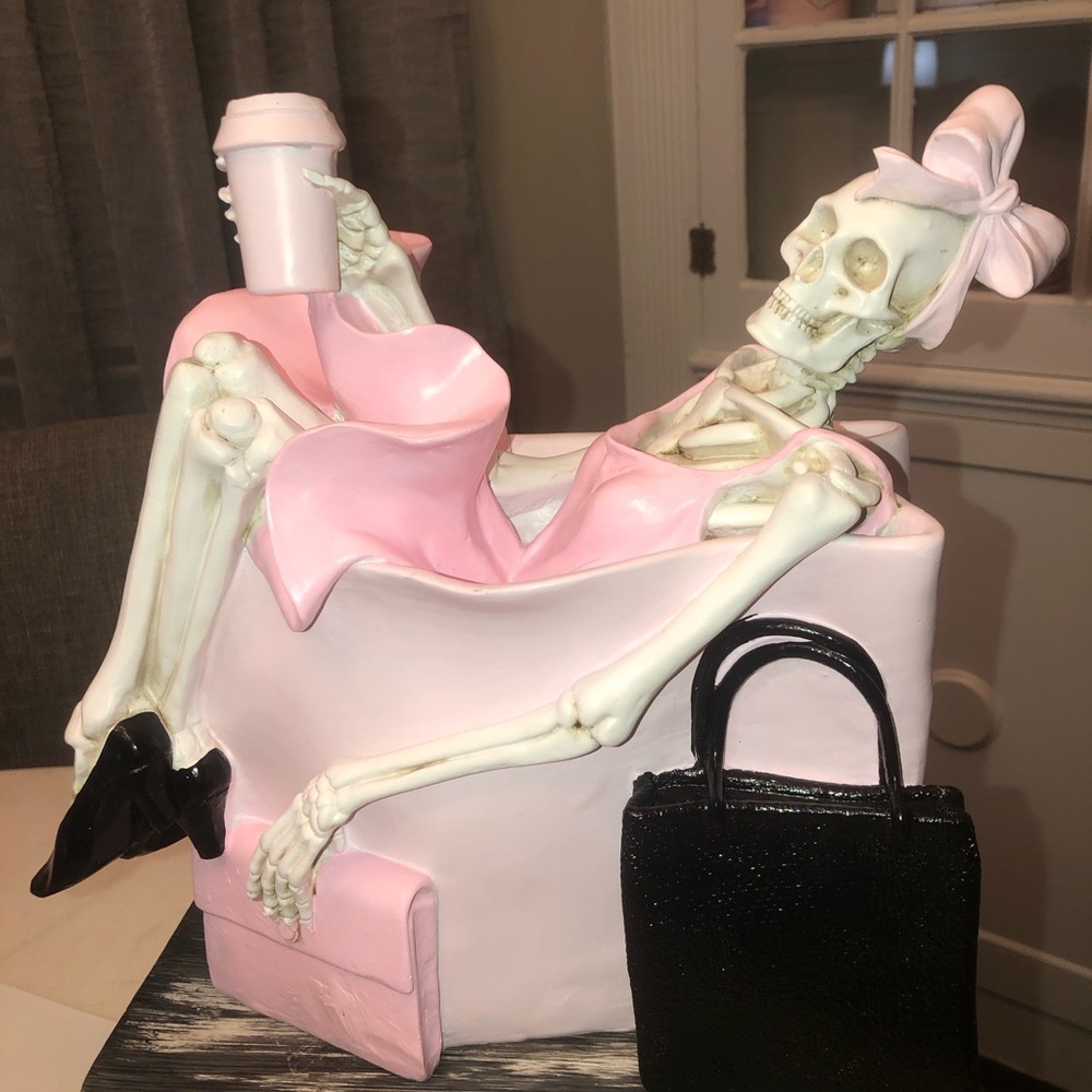 🖤 Skeleton with pink accents holding a coffee cup and handbag